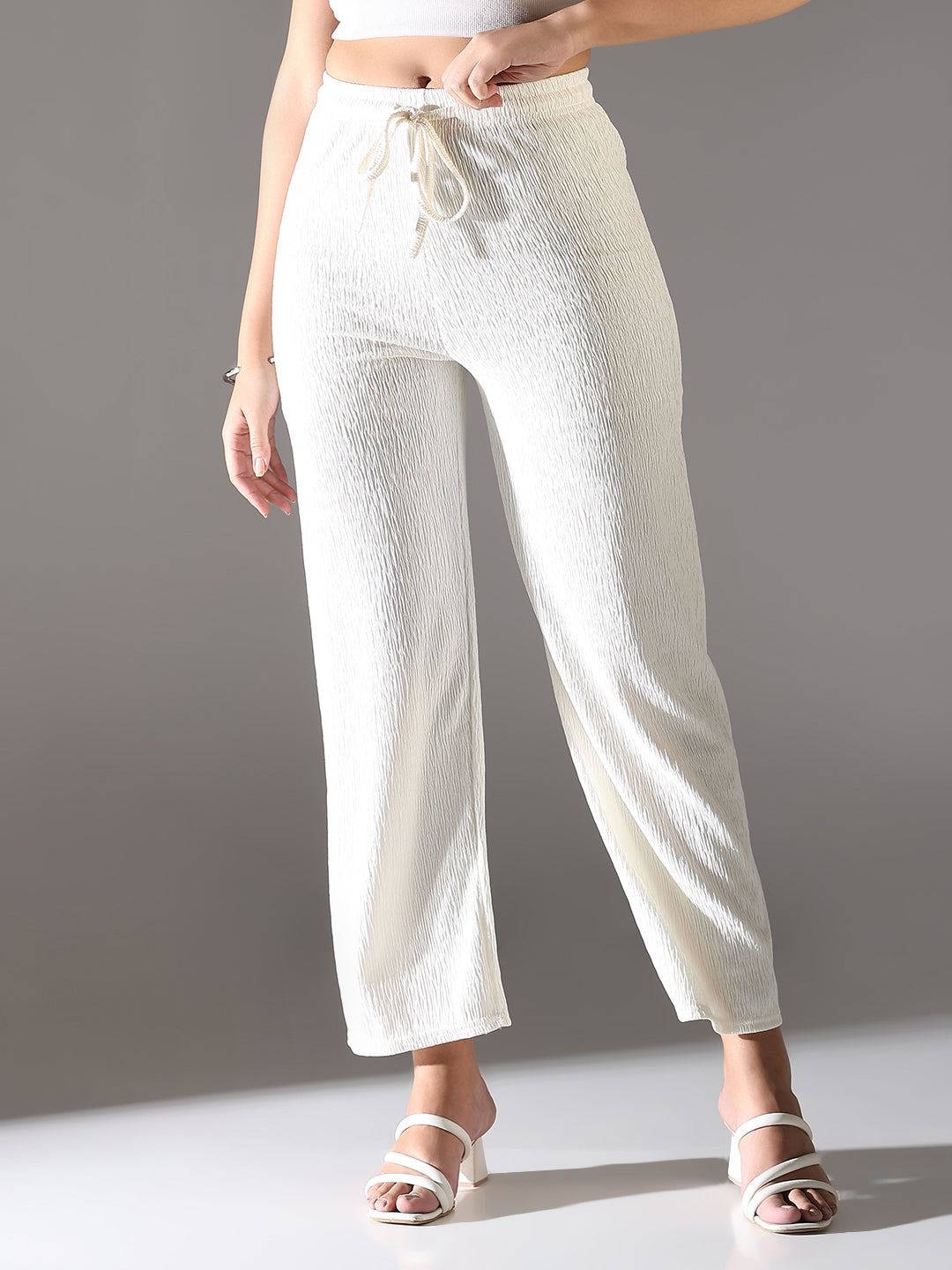 Women Off White Solid Parallel Trousers