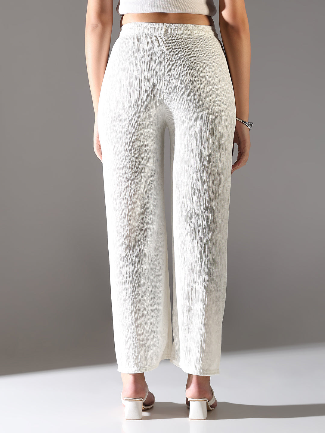 Women Off White Solid Parallel Trousers