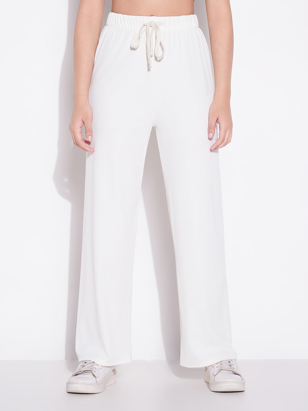 Women Off White Solid Parallel Trousers