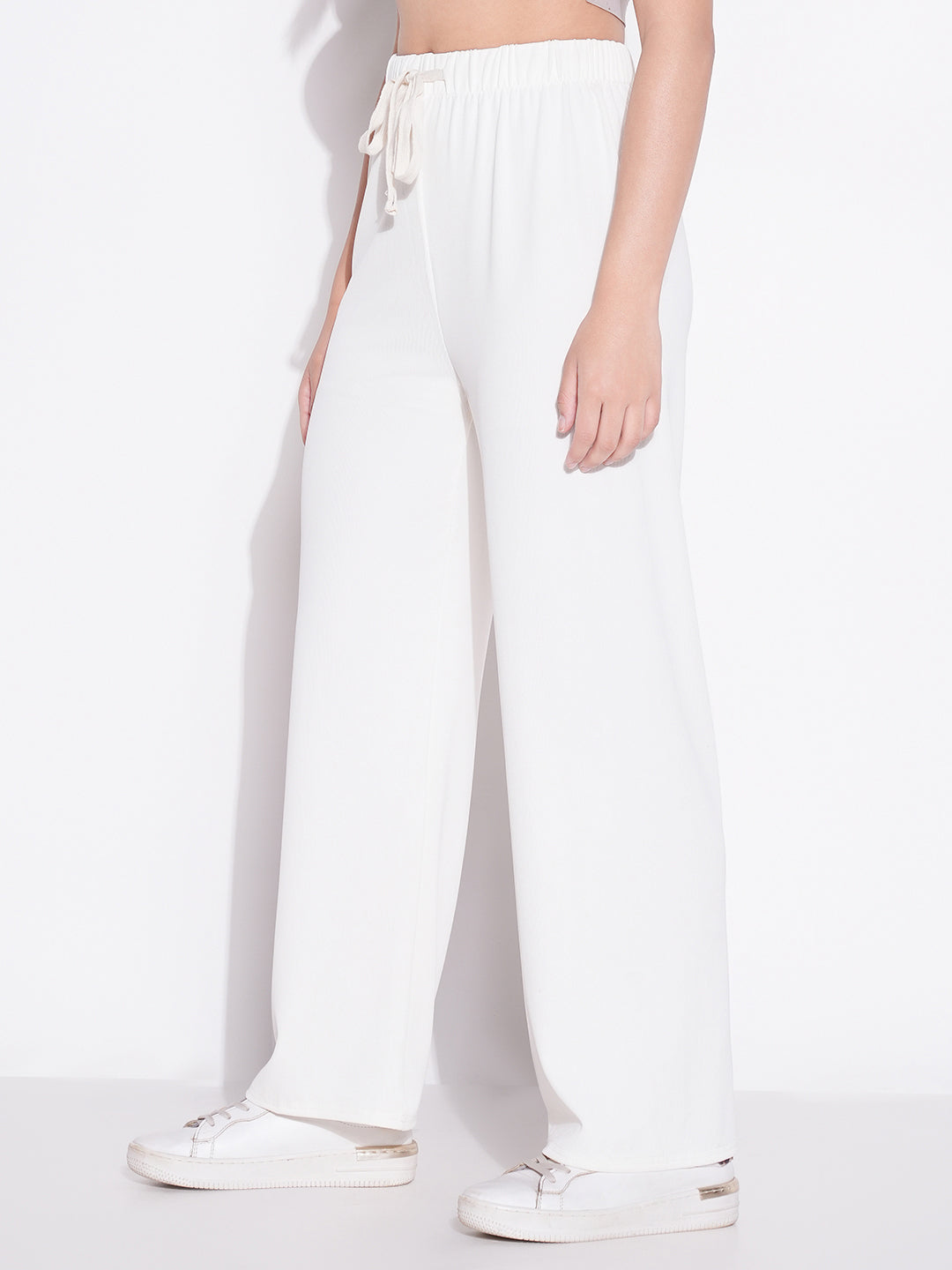 Women Off White Solid Parallel Trousers