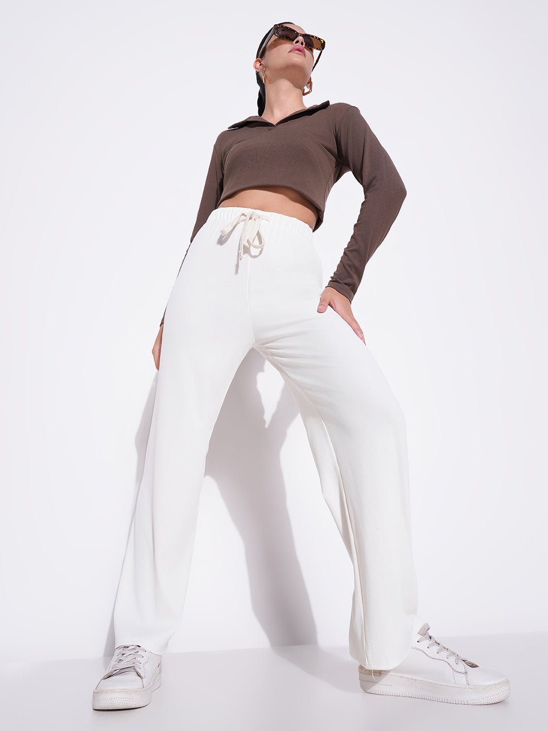 Women Off White Solid Parallel Trousers