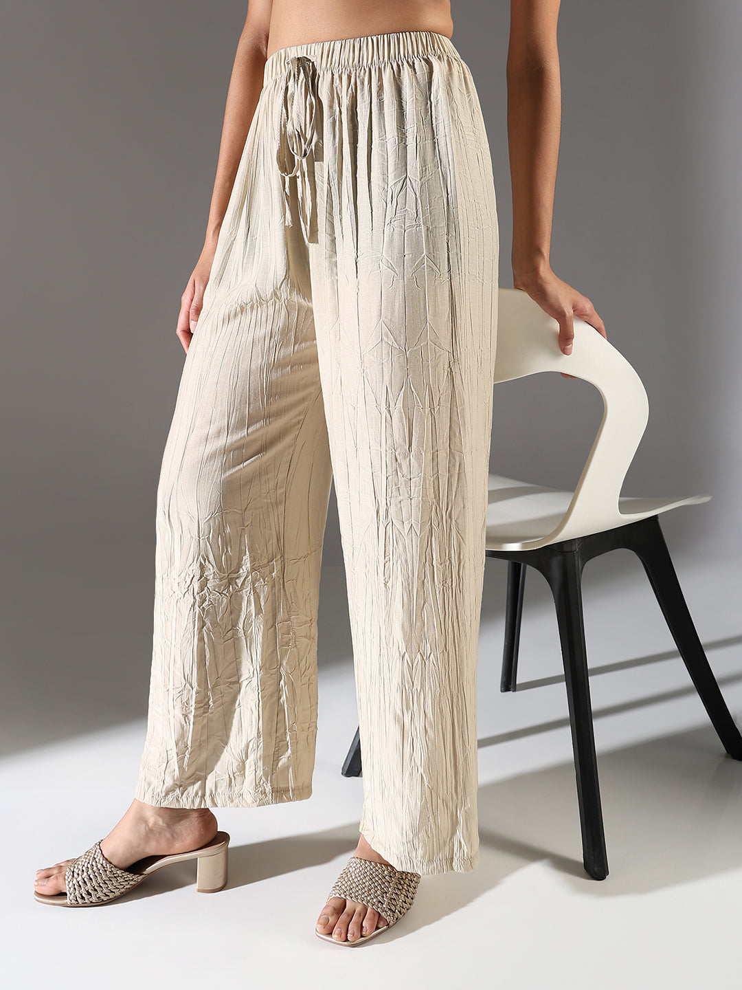 Women Beige Solid Straight Fit Parallel Trousers