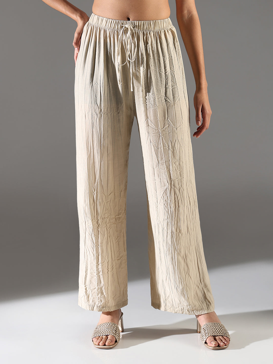 Women Beige Solid Straight Fit Parallel Trousers