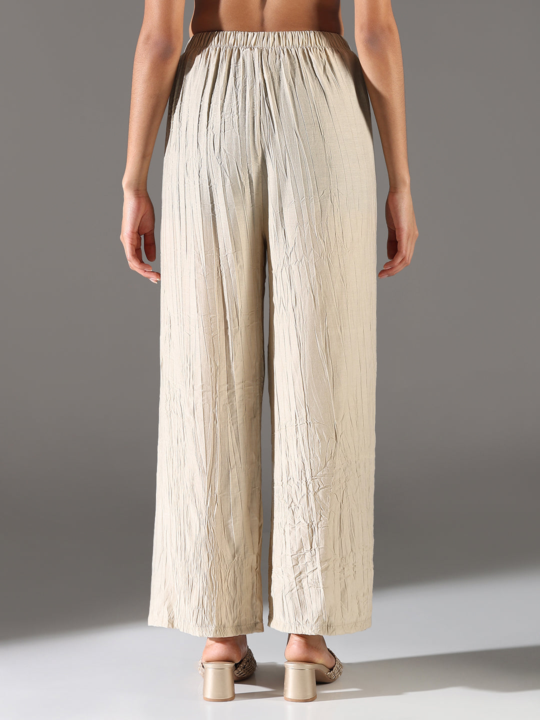 Women Beige Solid Straight Fit Parallel Trousers