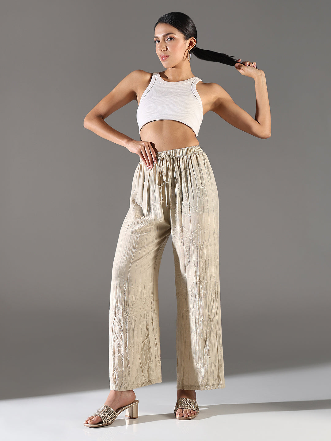 Women Beige Solid Straight Fit Parallel Trousers