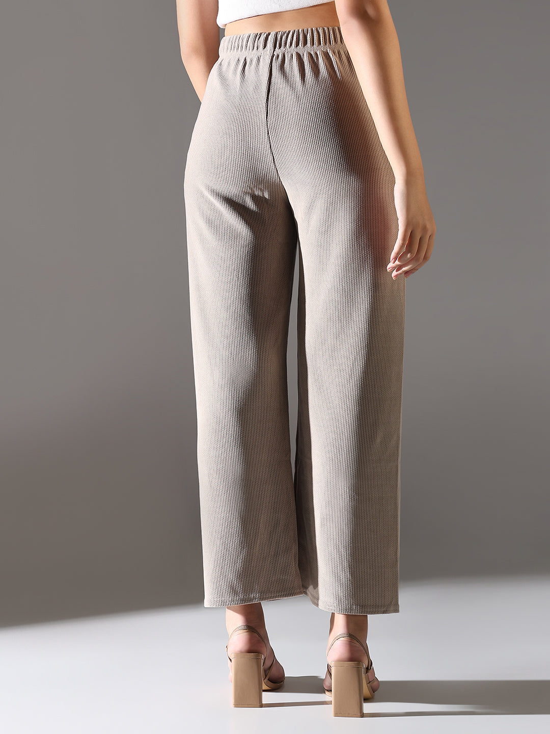 Women Beige Solid Parallel Trousers