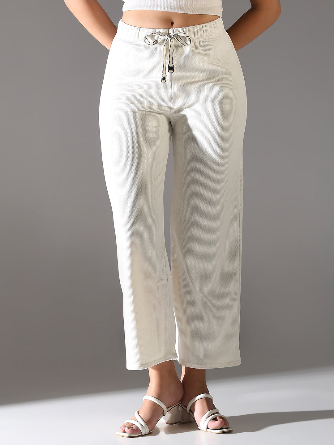 Women White Solid Parallel Trousers