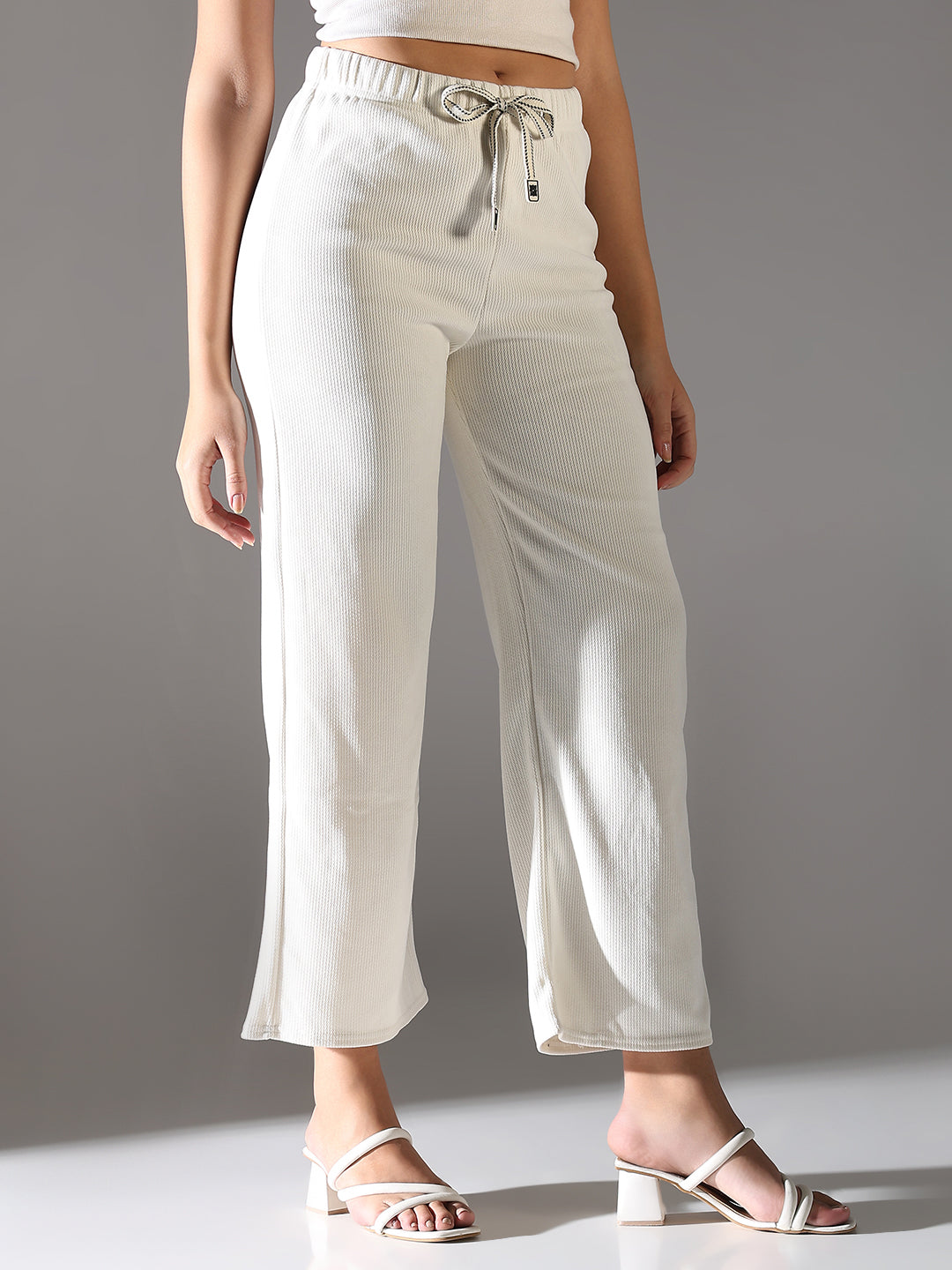 Women White Solid Parallel Trousers