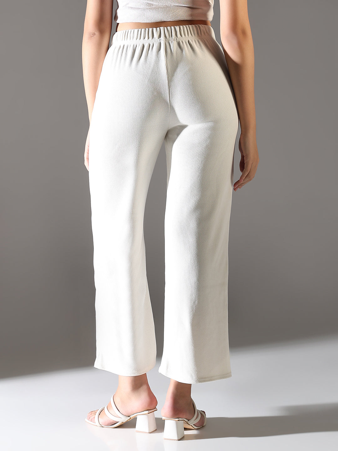 Women White Solid Parallel Trousers