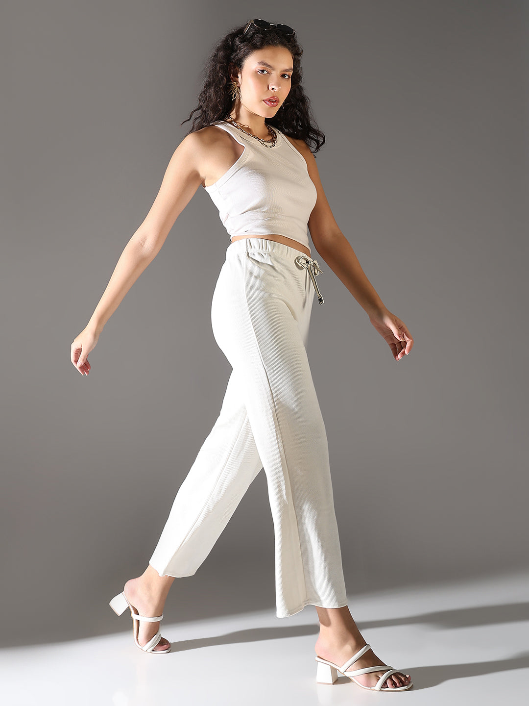 Women White Solid Parallel Trousers