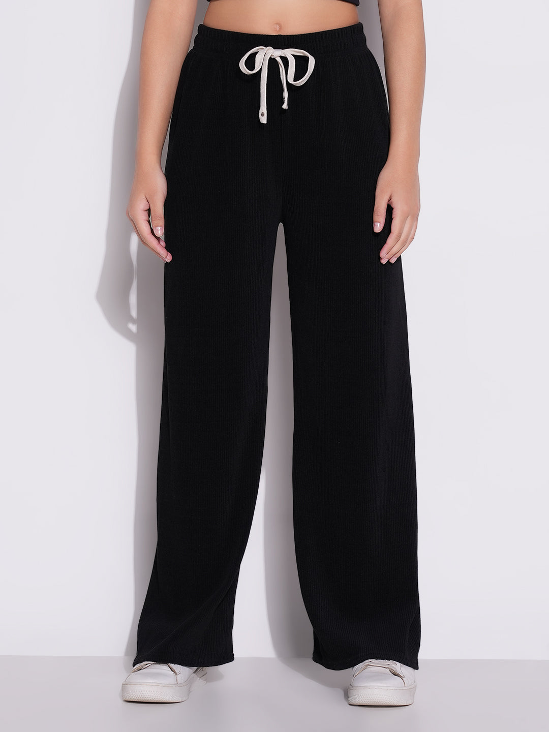 Women Black Solid Parallel Trousers