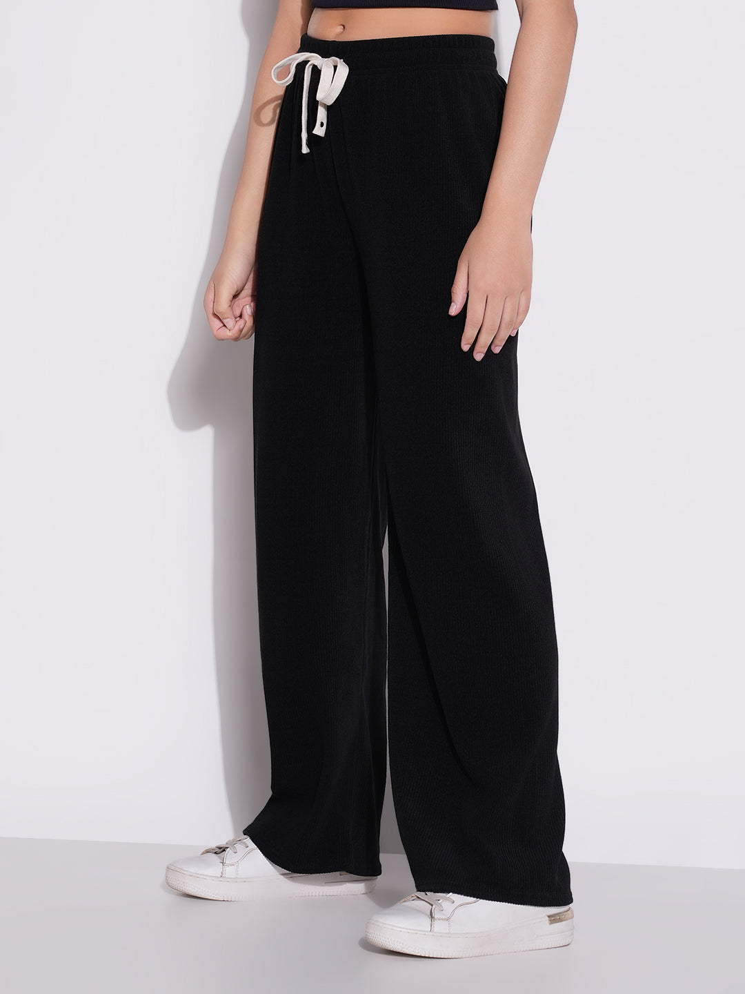 Women Black Solid Parallel Trousers