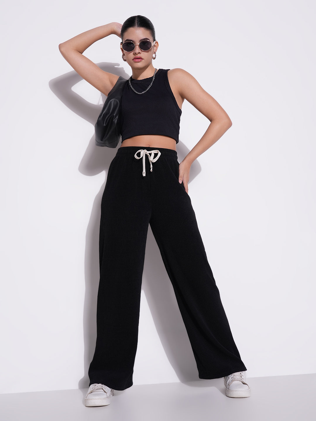 Women Black Solid Parallel Trousers