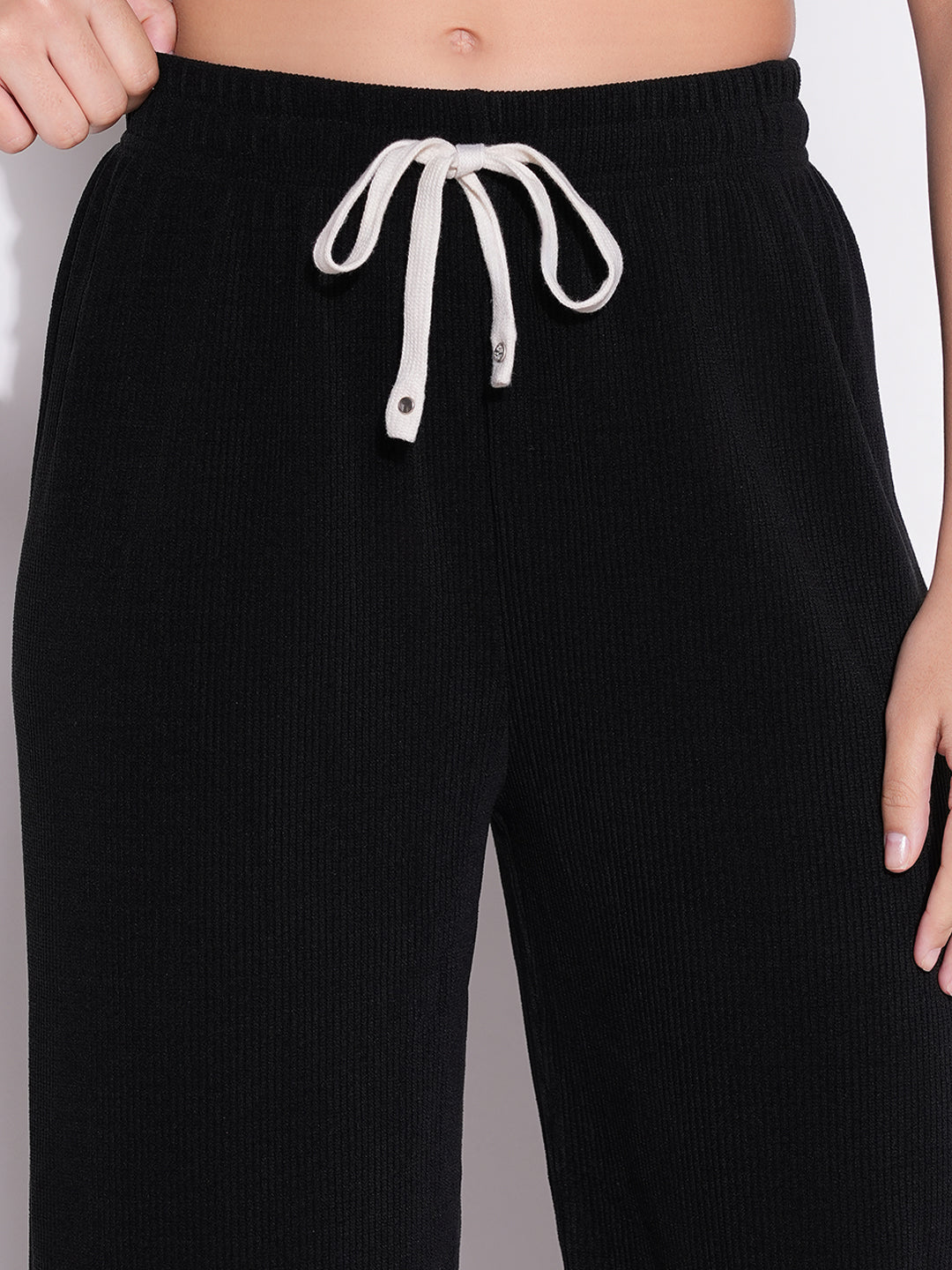 Women Black Solid Parallel Trousers