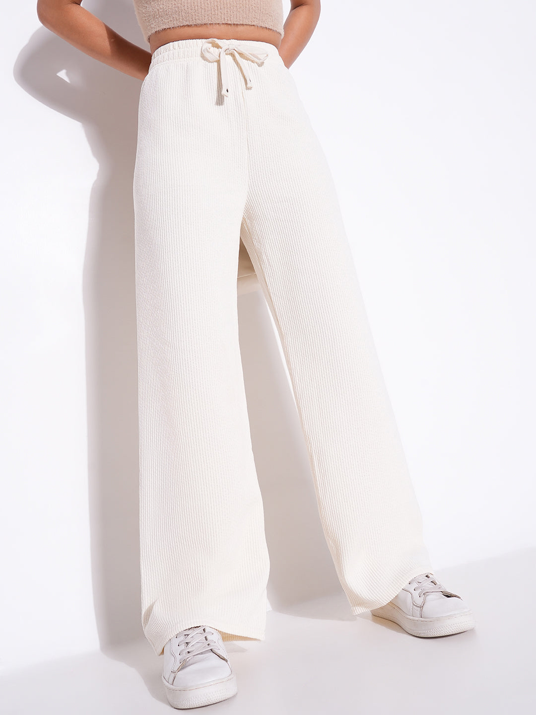 Women Off White Solid Parallel Trousers