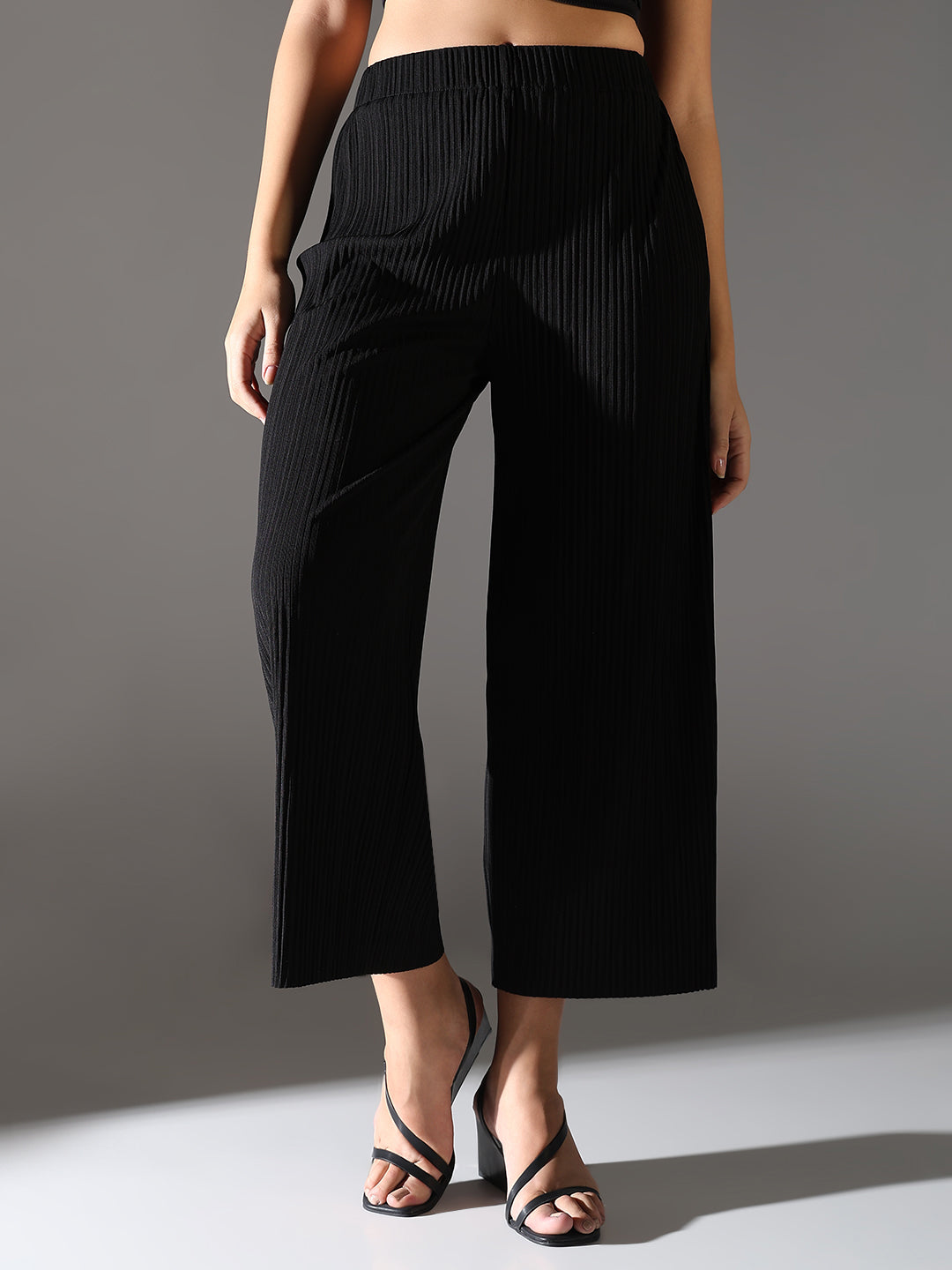 Women Black Solid Parallel Trousers