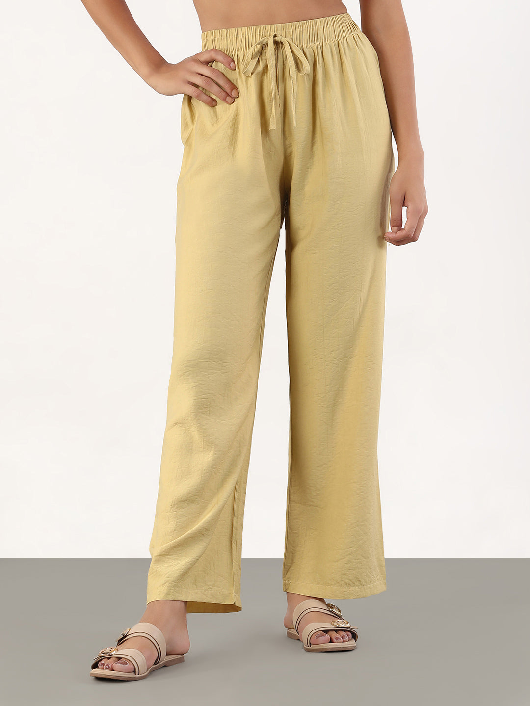 Women Beige Loose Fit Solid Parallel Trousers