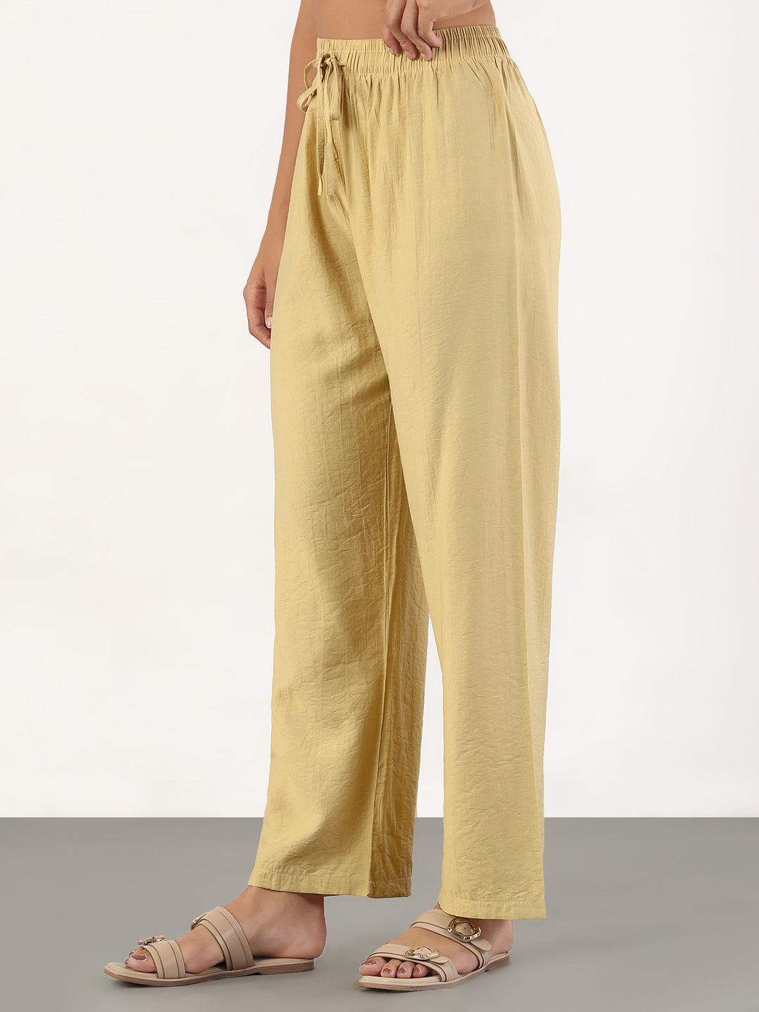 Women Beige Loose Fit Solid Parallel Trousers