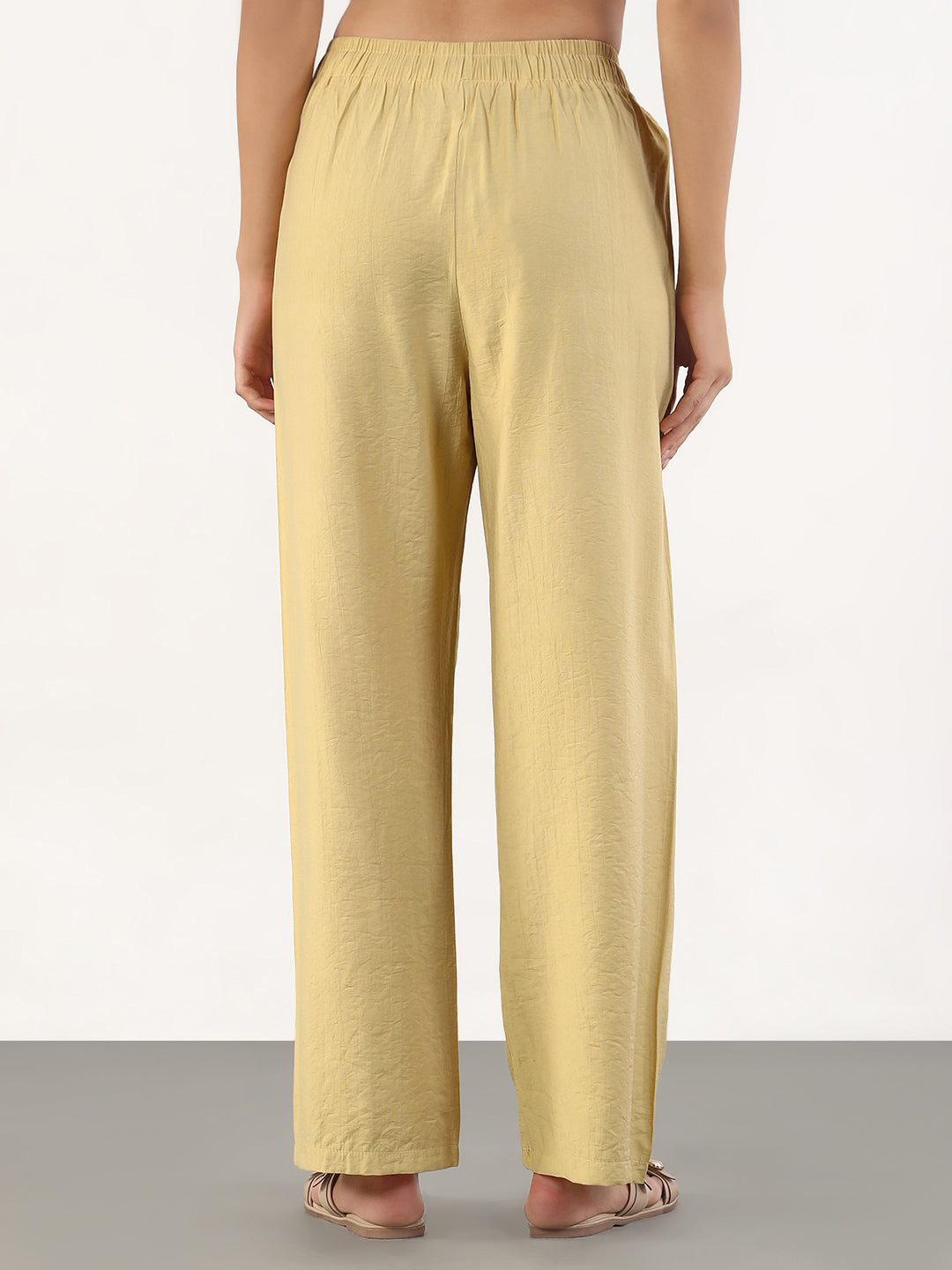 Women Beige Loose Fit Solid Parallel Trousers