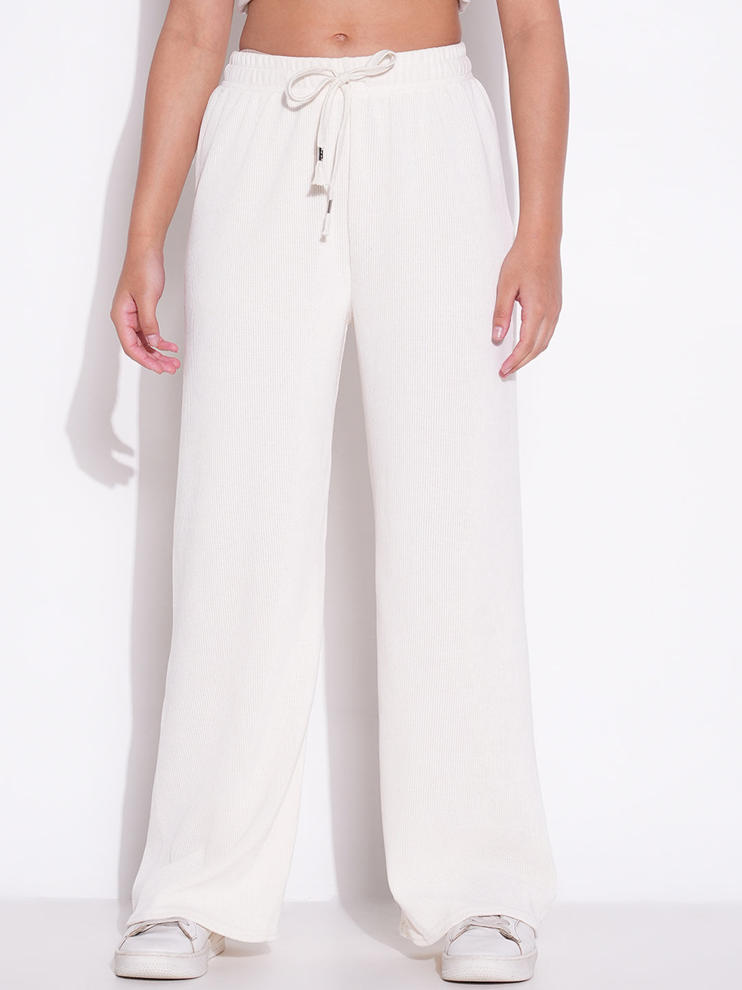 Women Off White Solid Parallel Trousers