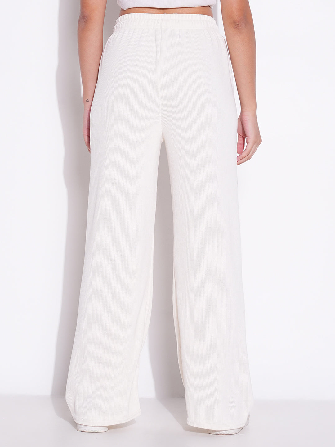 Women Off White Solid Parallel Trousers