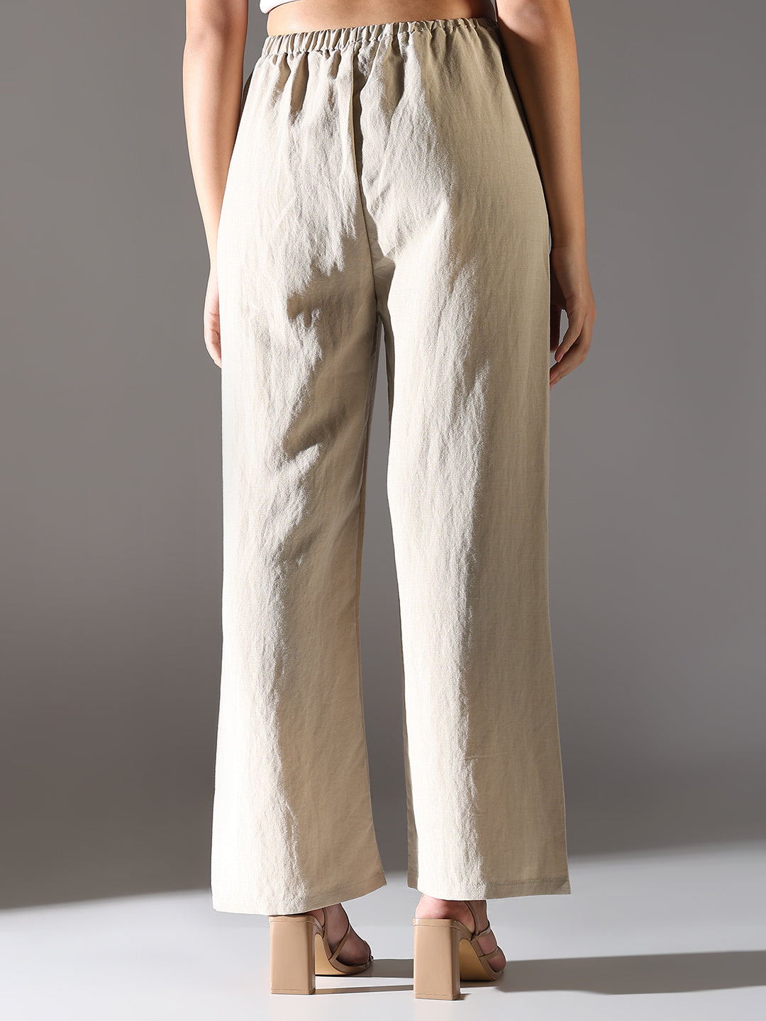 Women Beige Solid Parallel Trousers