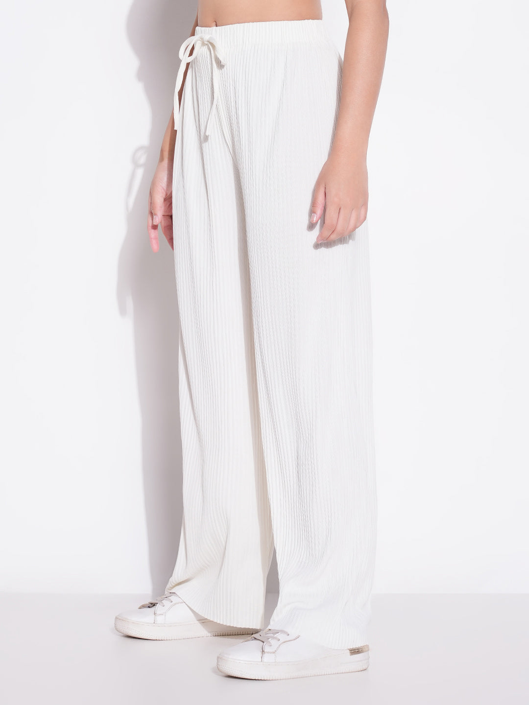 Women Off White Solid Parallel Trousers