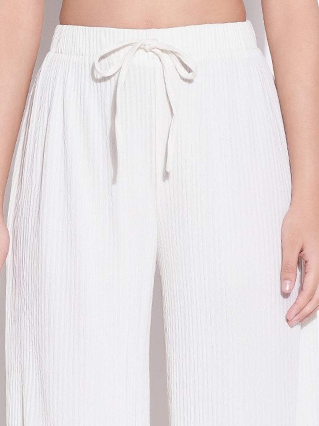 Women Off White Solid Parallel Trousers