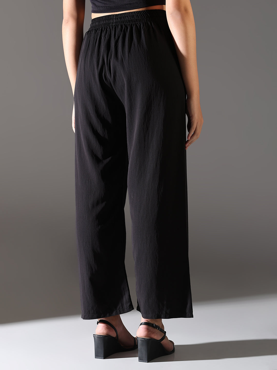 Women Black Solid Parallel Trousers