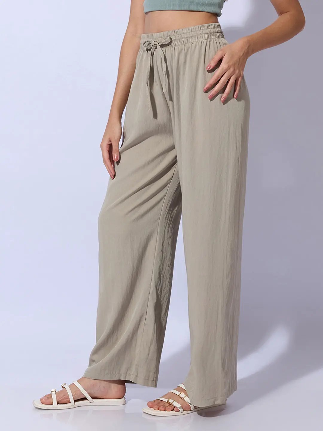 Women's Green Solid Straight Fit Parallel Palazzos - Uncategorized from SHOWOFFFF