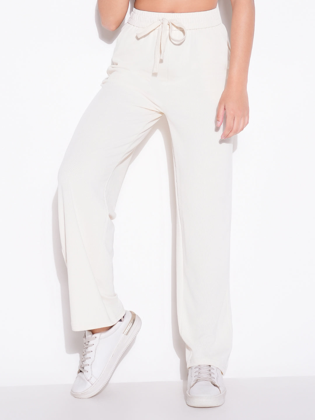 Women Cream Solid Parallel Trousers