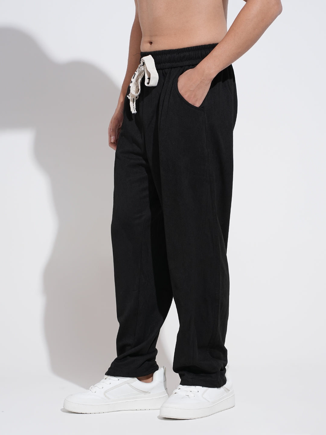 Men's Black Relaxed Fit Trousers with Elasticated Waist and Stylized Drawcord