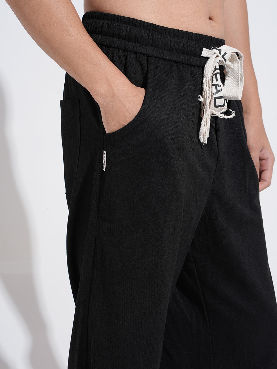 Men's Black Relaxed Fit Trousers with Elasticated Waist and Stylized Drawcord