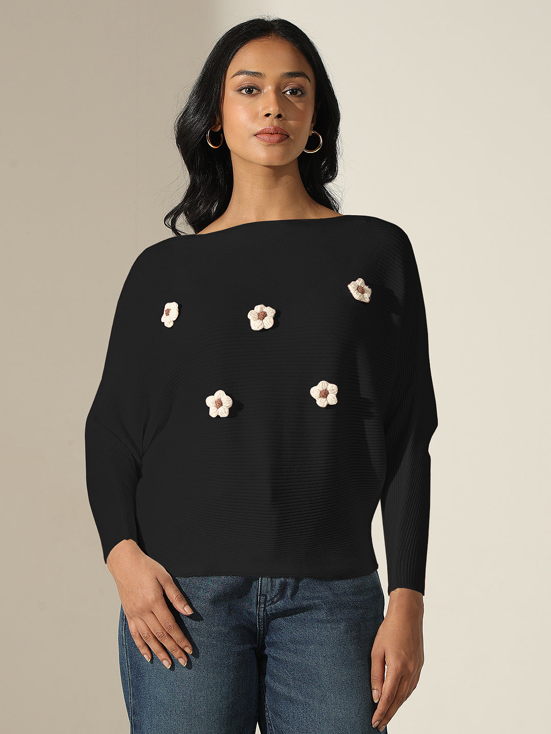 Women's Black Textured Knit Top with Flower Applique Detail