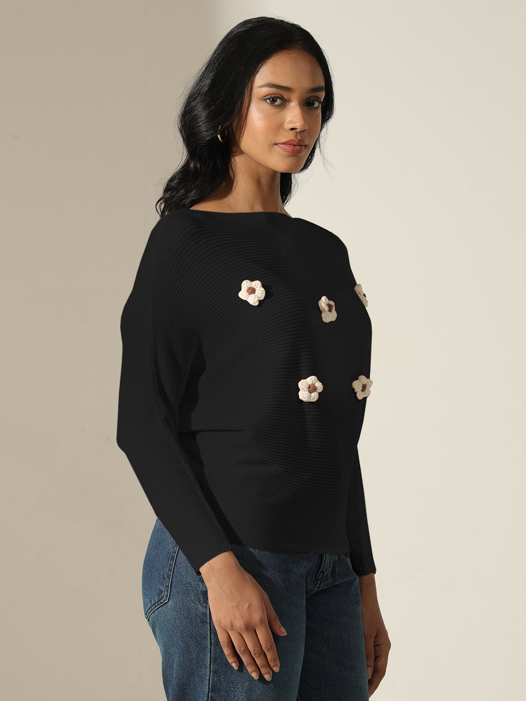 Women's Black Textured Knit Top with Flower Applique Detail