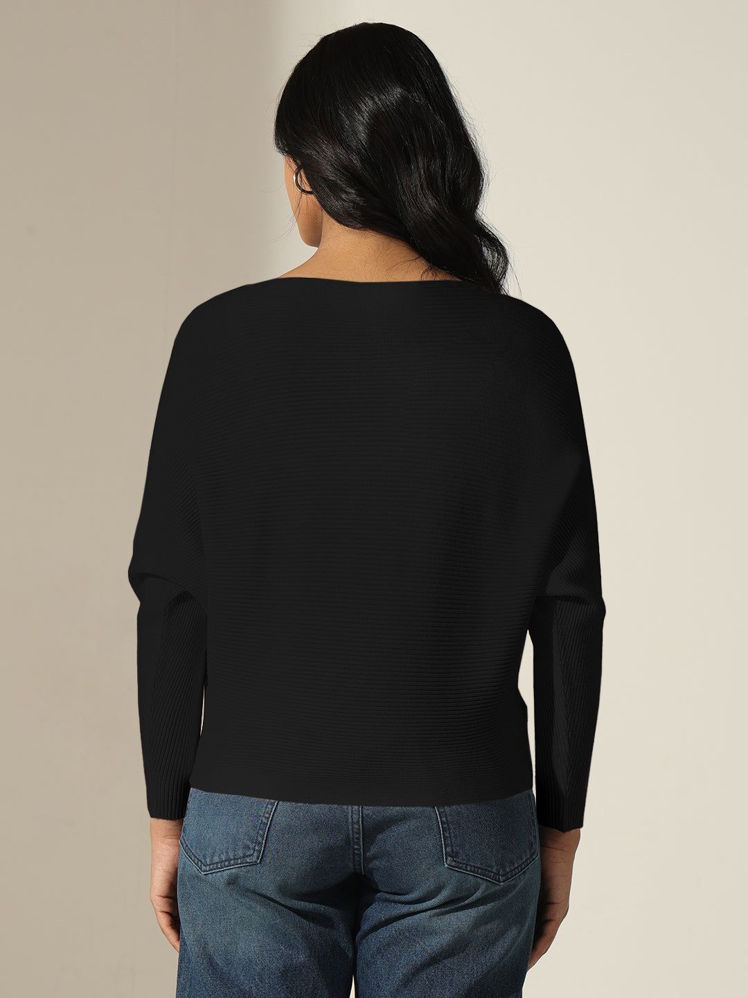 Women's Black Textured Knit Top with Flower Applique Detail
