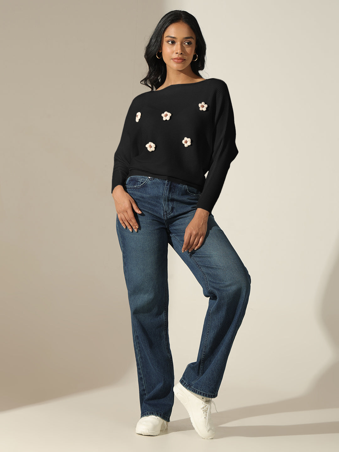 Women's Black Textured Knit Top with Flower Applique Detail