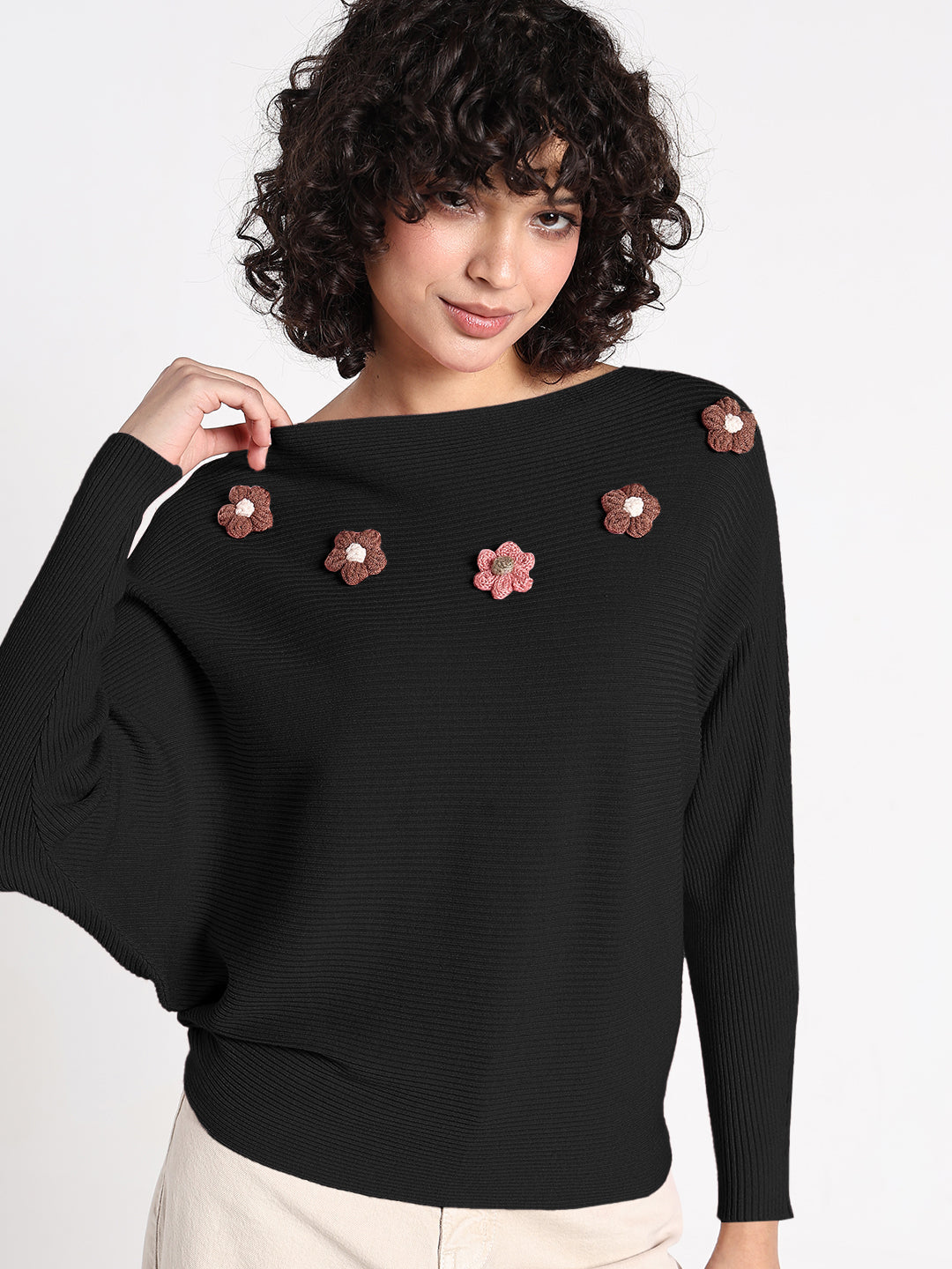 Women's Black Textured Knit Top with Flower Applique Detail