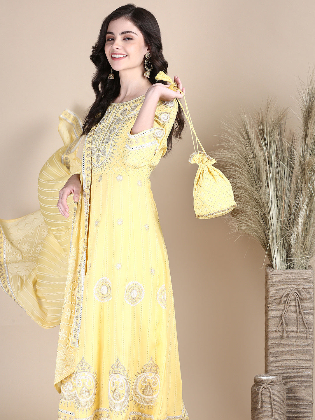 Women Ethnic Motifs Yellow Anarkali Kurta Set with Dupatta and Potli Bag