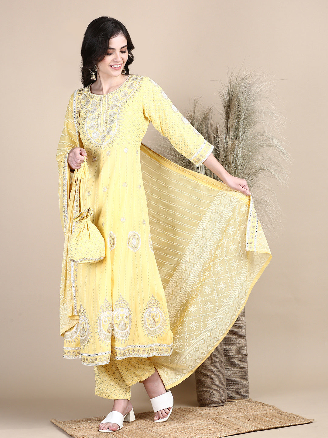 Women Ethnic Motifs Yellow Anarkali Kurta Set with Dupatta and Potli Bag