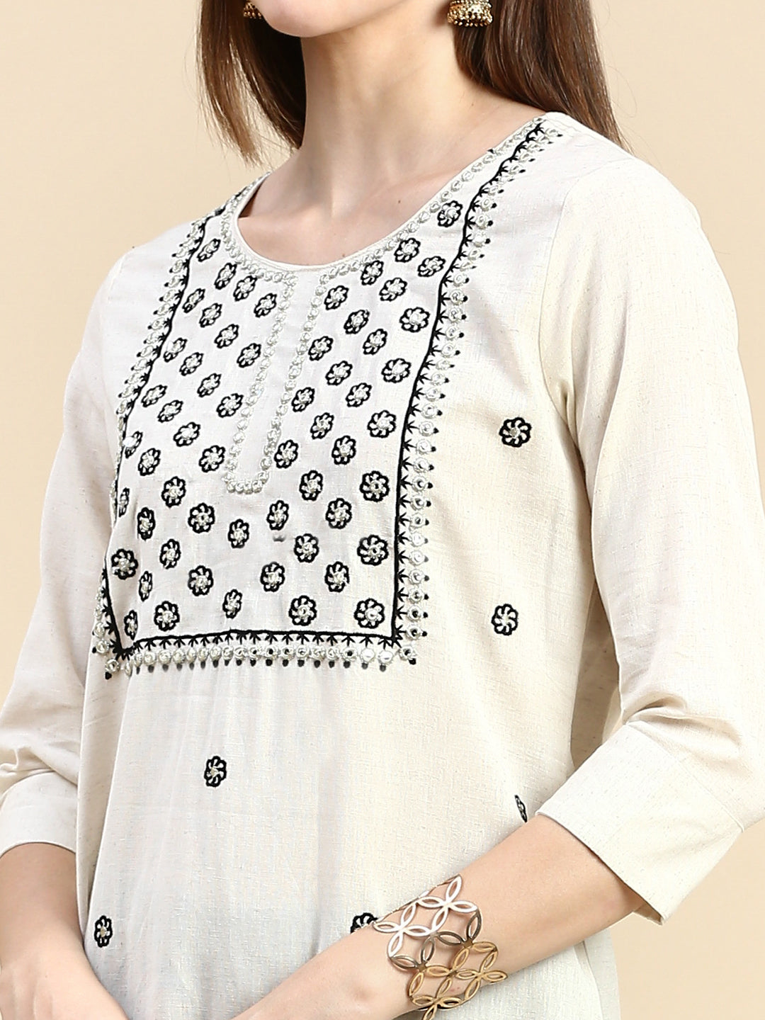 Women Solid Cream Straight Kurta