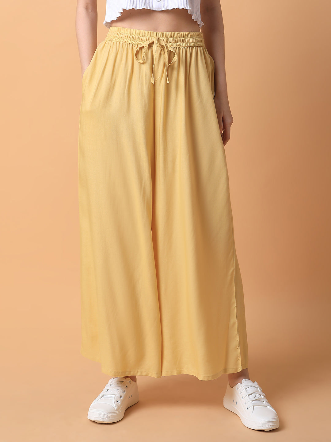 Women Yellow Solid Pleated Loose Fit Trouser