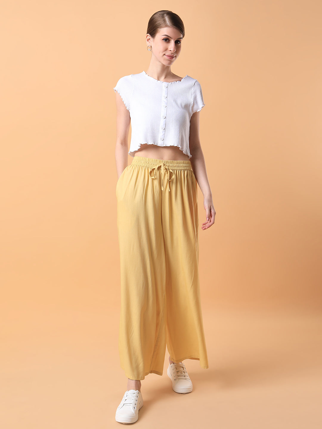 Women Yellow Solid Pleated Loose Fit Trouser