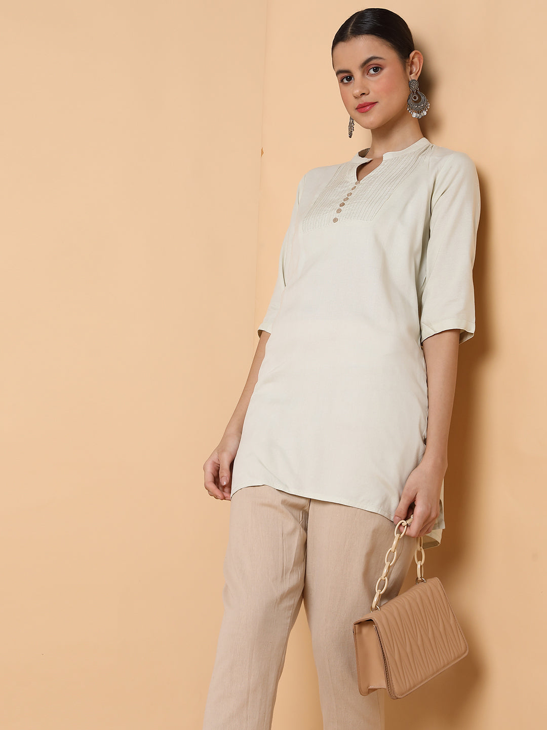 Women Solid Beige Straight Kurti