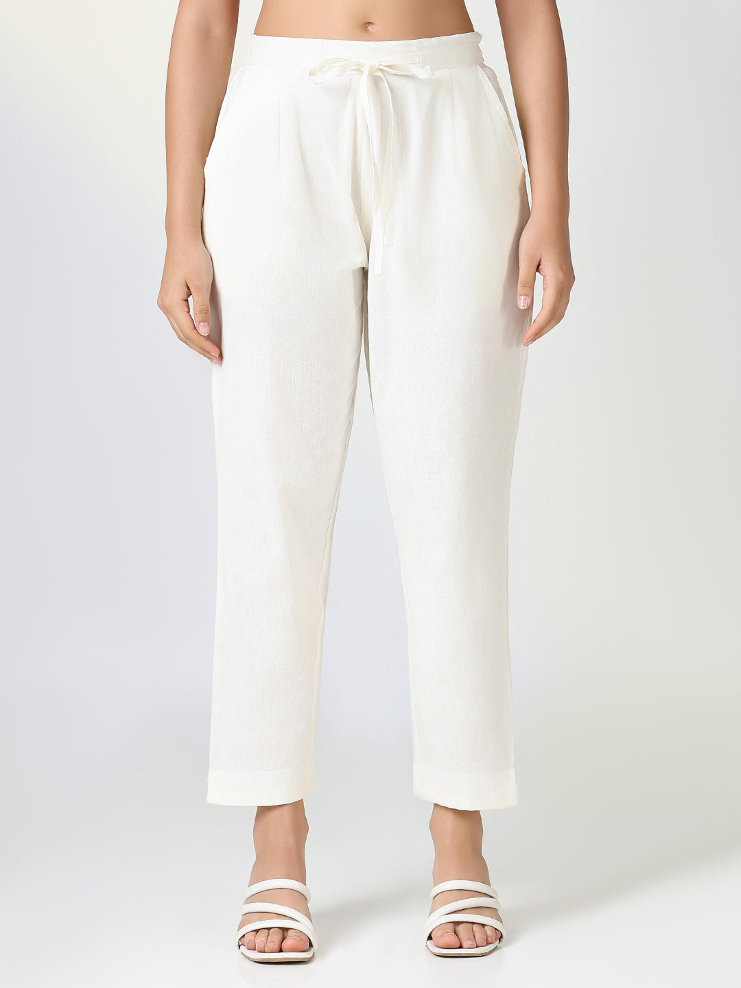 Women Solid Cream Slim Fit Trousers