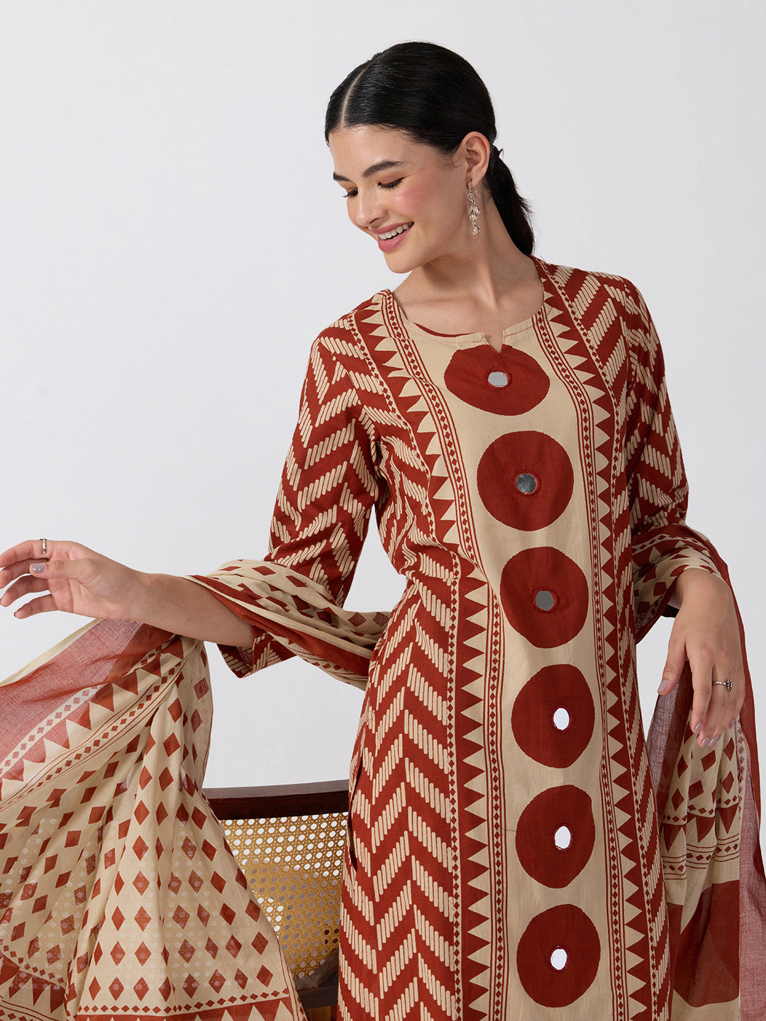 Women’s Geometric Printed Rust Straight Kurta Set with Mirror Detail and Dupatta