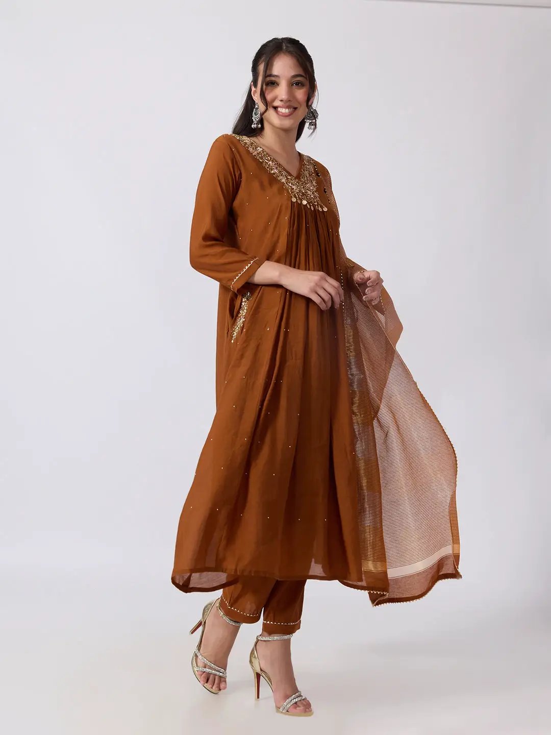 Women's Embellished Brown Flared Kurta Pant Set with Gold Floral Detailing and Striped Dupatta