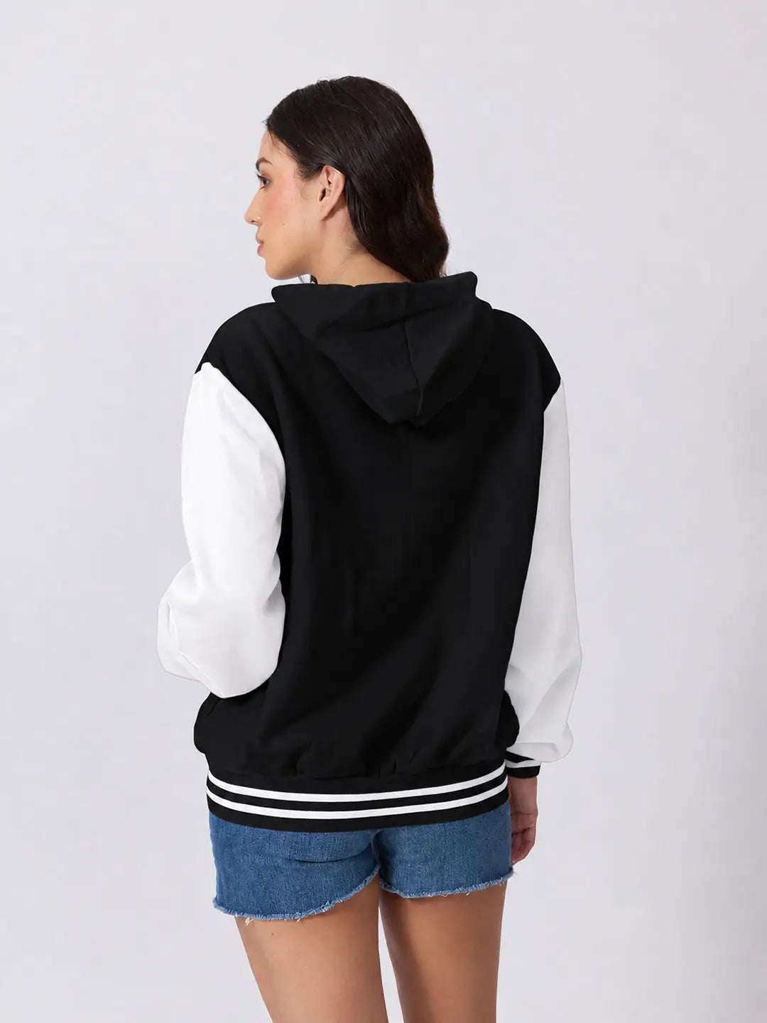 Women's Printed Black Hooded Jacket with Contrast Sleeves and Striped Ribbed Hem