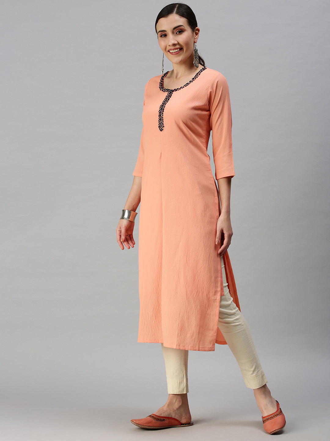 Women Solid Peach Straight Kurta