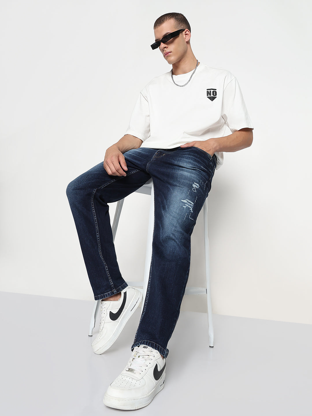 Men's Navy Blue Relaxed Fit Jeans with Distressed Patches